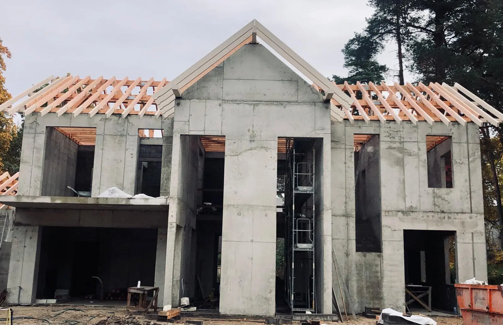 Concrete frame of a house with roof rafters